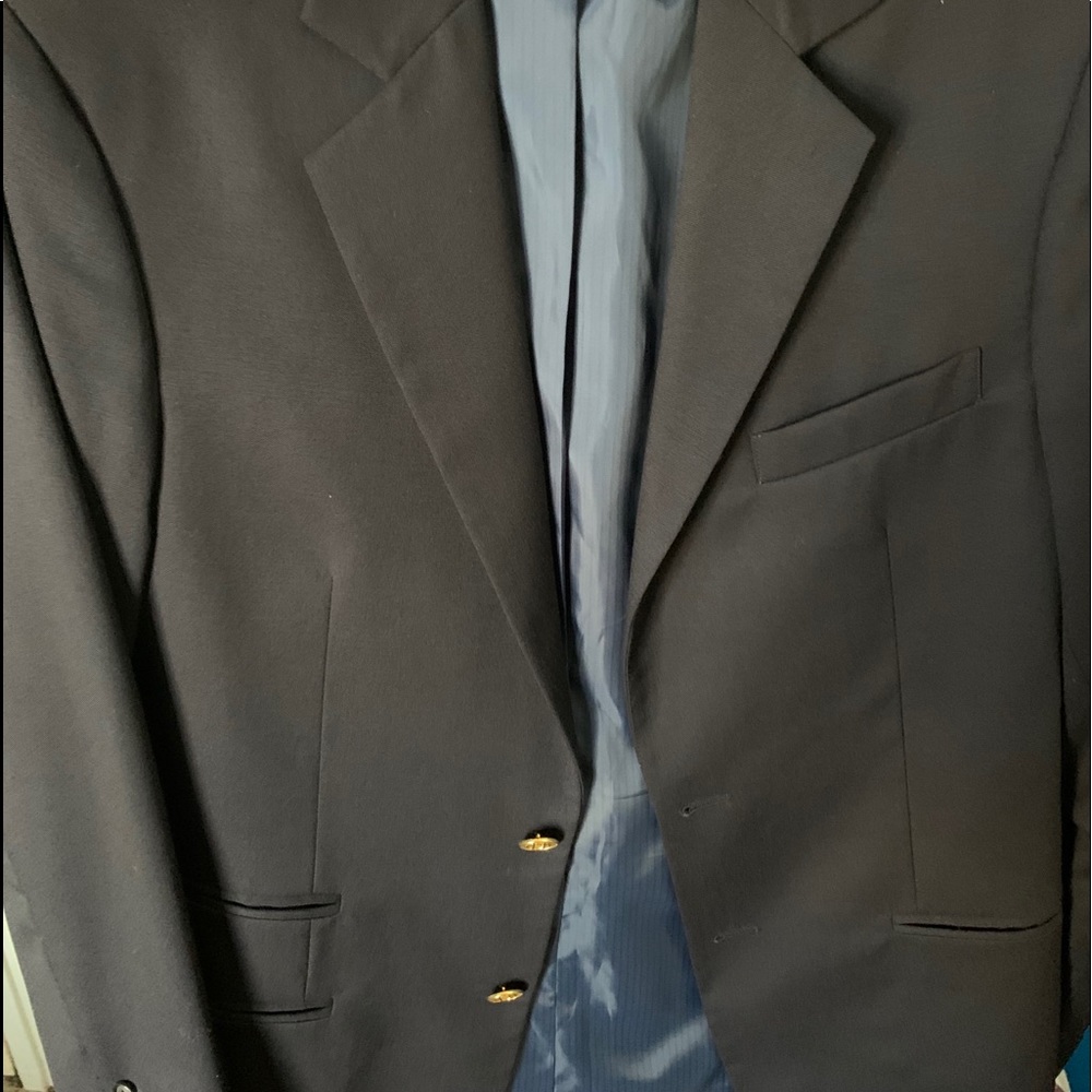 Blue sports coat with gold buttons